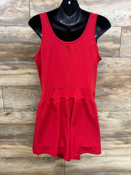 Front view of red Isabel maternity romper on black mannequin showing scoop neckline, gathered waist and shorts against wood background