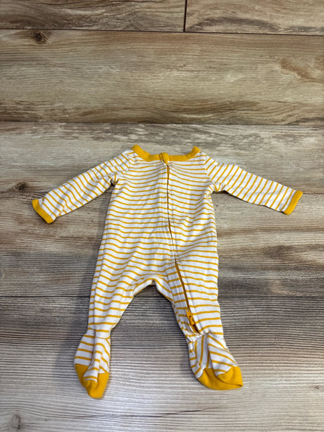 Front flat-lay of Cat & Jack newborn footed sleeper with white and yellow stripes, front zipper, on wood background
