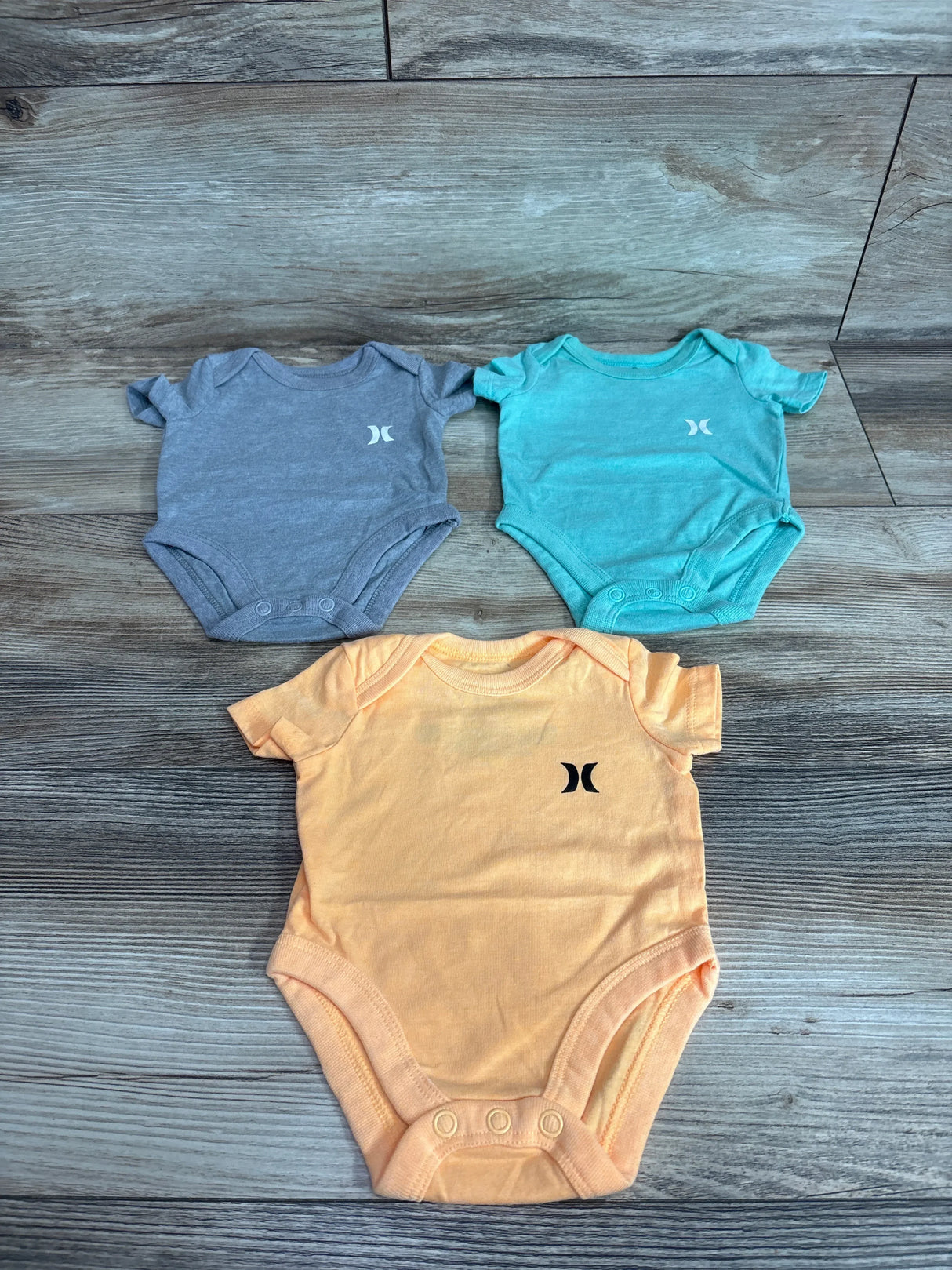 Hurley 3pk Bodysuits Orange sz Newborn
