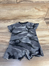Gray camouflage baby romper with short sleeves on wooden floor