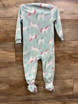 Front view of Carter’s blue blanket sleeper in size 2T showcasing long sleeves, footed legs, and unicorn print on a wood background
