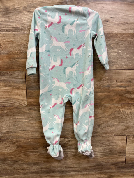 Front view of Carter’s blue blanket sleeper in size 2T showcasing long sleeves, footed legs, and unicorn print on a wood background