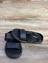 Top-front view of MGBABY toddler foam sandals showcasing dual wide straps and cushioned footbed on wood floor background