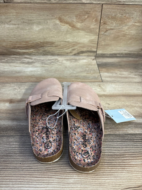 Top-down view of Cat & Jack Perry toddler clogs in blush showcasing floral printed insoles, cork footbed, and adjustable strap on wood background