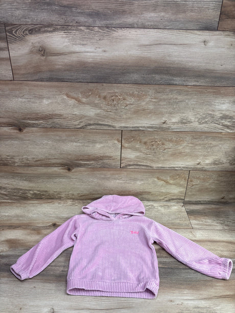 Pink metallic ribbed hooded sweater by Me n Mommy To Be on a wooden background