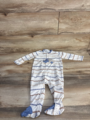 Striped baby onesie with blue and brown lines and a blue truck on chest, laid on wooden floor