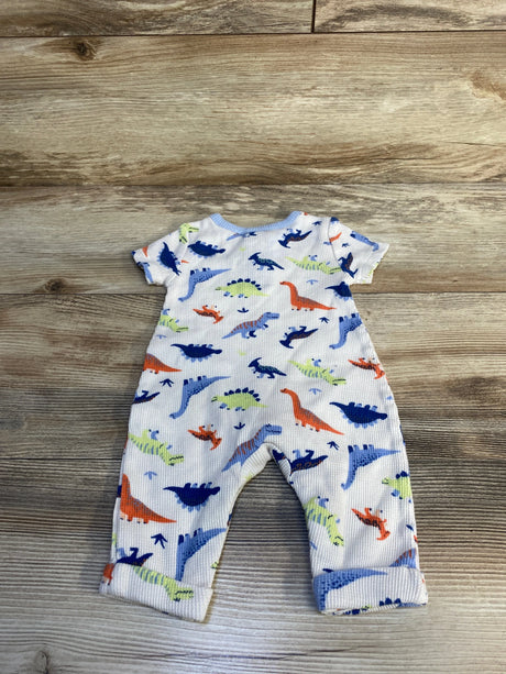 Colorful dinosaur print baby romper on wood background, gently used kids clothing