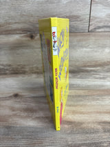 Yellow children's book "Wacky Wednesday" by Dr. Seuss standing upright on wooden surface