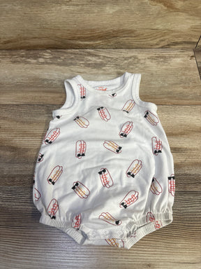 Top-down view of white Cat & Jack bubble romper with repeating hot dog print, sleeveless with elastic leg openings on wood background