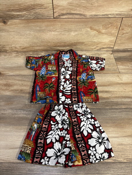 Flat lay of red 2-piece cabana set (shirt and shorts) showing tropical hibiscus print, button-front shirt and elastic waist on wood background