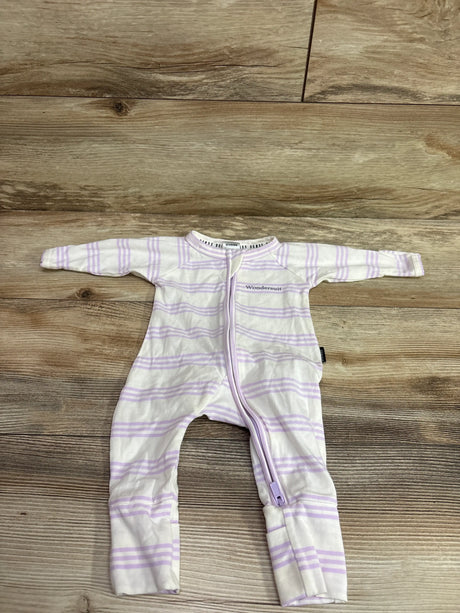 Front view of Bonds striped Wondersuit showcasing full-length zipper and footed legs on a wood floor