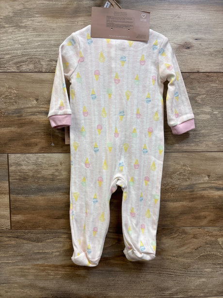 Front view of Chick Pea ice cream sleeper and headband set showing pink sleeper with pastel ice cream print on wood background