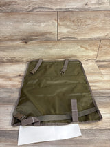 Top-down view of Tike Smart Clean-Edge kick mat showing olive-green waterproof surface and adjustable straps on wood floor