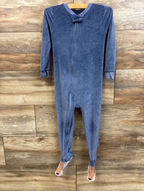Front view of Just One You blanket sleeper showcasing blue stripes and front zipper on a wood floor