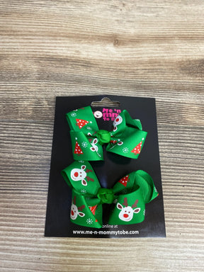 Green Christmas hair bows with reindeer and tree print for kids, festive holiday accessory
