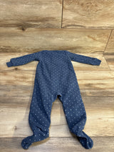 Blue Carter's blanket sleeper with white polka dots for 9 month old baby on wood background