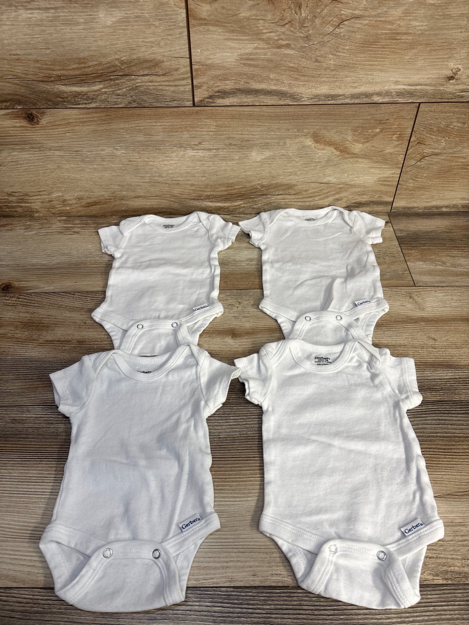 Gerber 4pk Bodysuit Set White sz Newborn