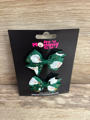 Green and white floral hair bows with gold glitter, kids accessories on black card