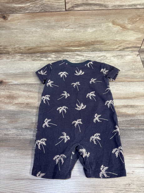 Back view of grey baby shortie romper (12m) with white palm tree print and short sleeves on wood background