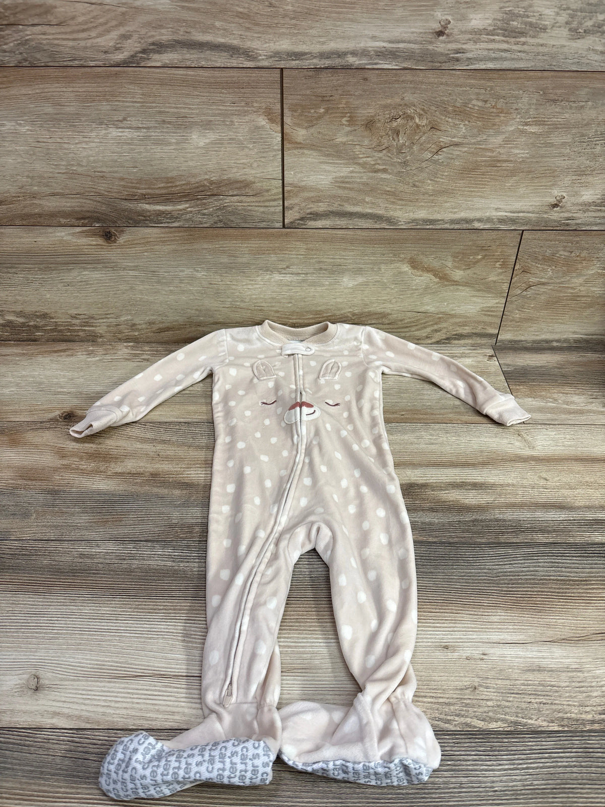 Tan Carter's blanket sleeper for infants with white polka dots and a deer face on the chest.