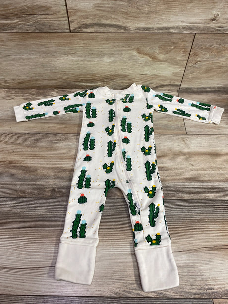 Top view of M+A by Monica + Andy Cactus Sleeper showcasing cactus print, front zipper, and fold-over cuffs on a wood floor
