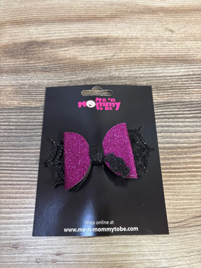 Pink glitter bow with black spiderweb and spider, kids Halloween hair accessory on display card