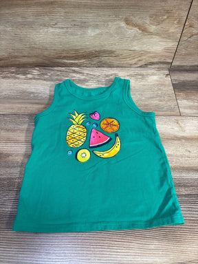 Flat lay of green Cat & Jack 3T tank top showing colorful fruit illustration on wood floor background