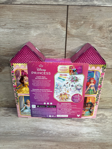 Front view of Disney Princess Castle DIY bracelet kit box showing packaged beads, charms, and princess artwork on wood floor