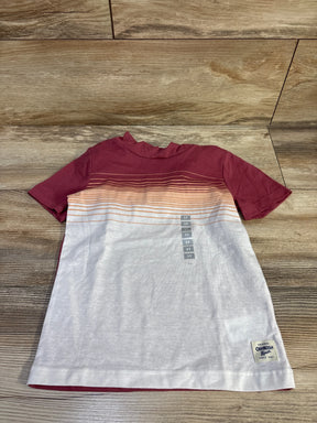 Top-down of maroon and white Oshkosh 5T hooded shirt with ombre stripes, brand patch and size stickers on wood floor