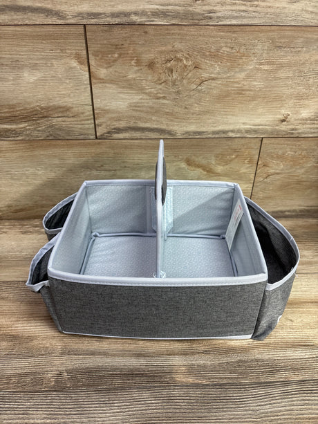 Front view of Munchkin Portable Diaper Caddy Organizer in Grey showing divided compartments and side pockets