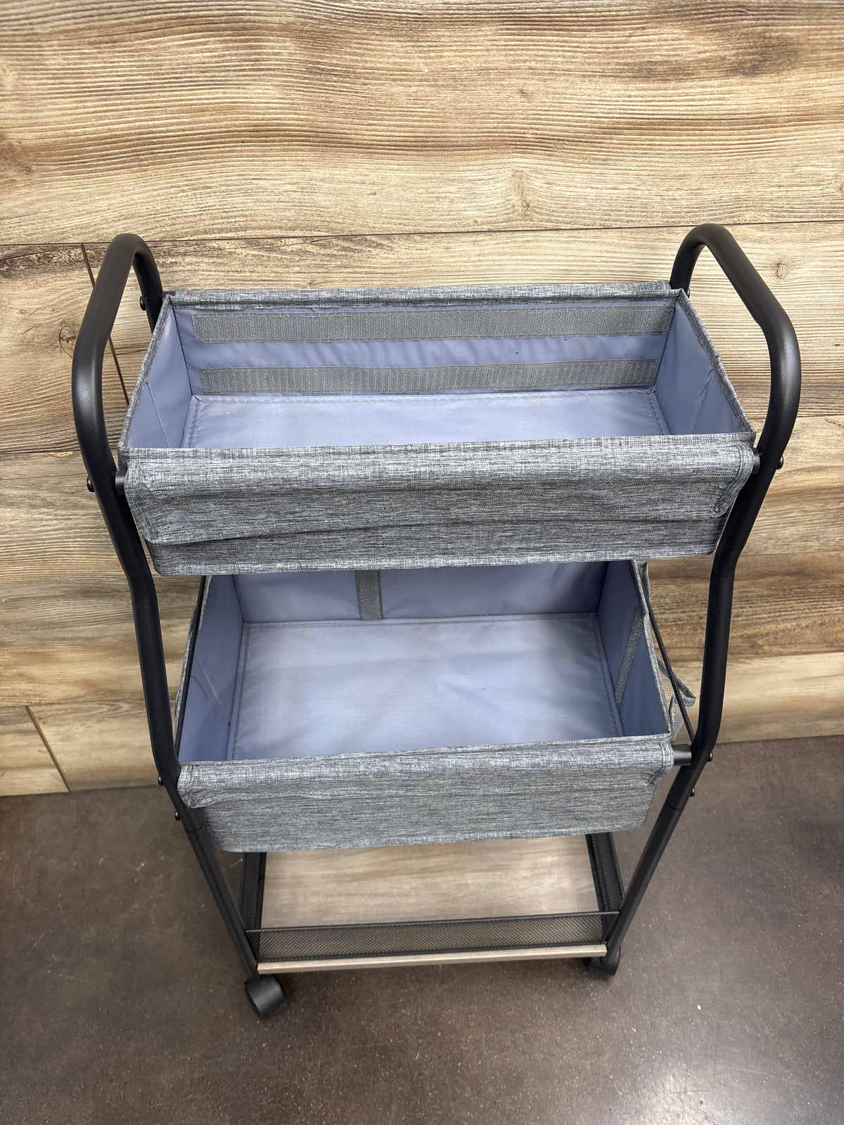 Front view of 3-tier baby diaper caddy organizer and storage cart with two gray drawers and a mesh shelf