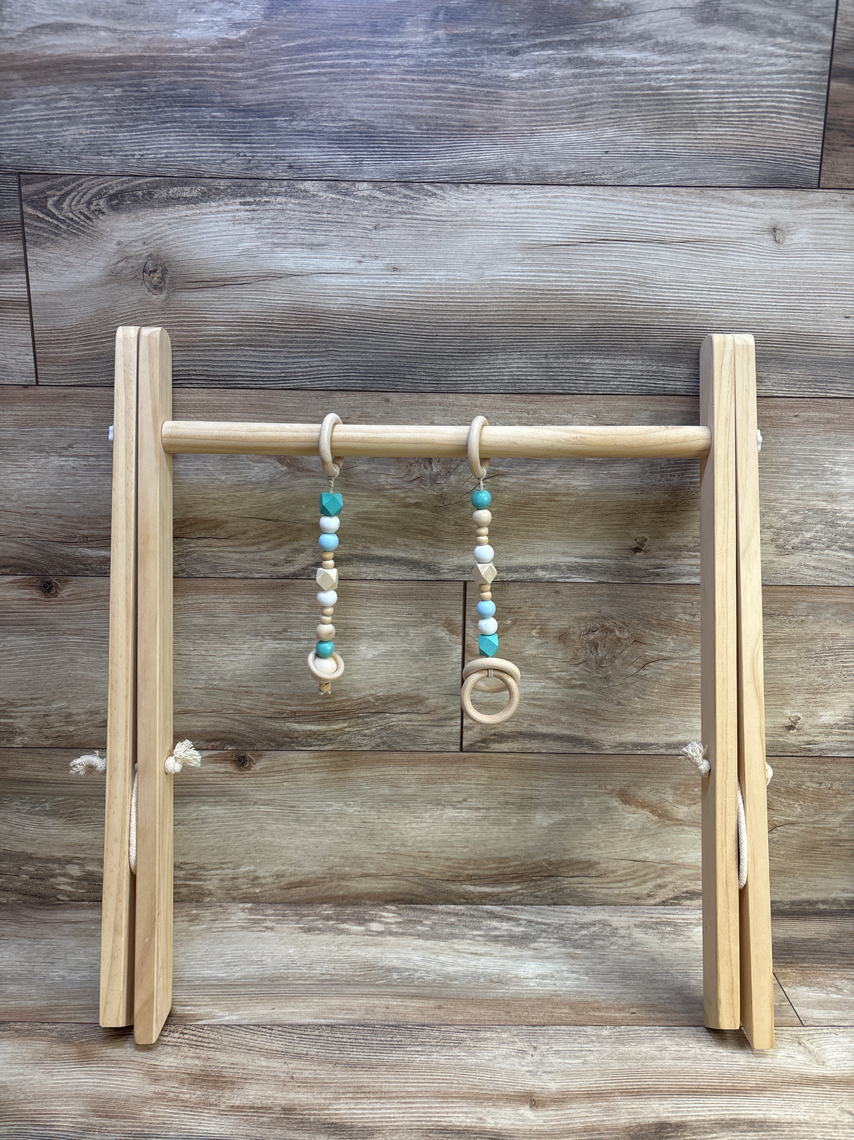 SlickBlue Wooden Play Gym with 2 Hanging Toys