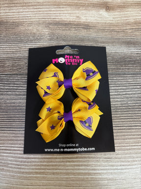 Yellow and purple witch hat hair bows for kids, Halloween-themed accessory on black card