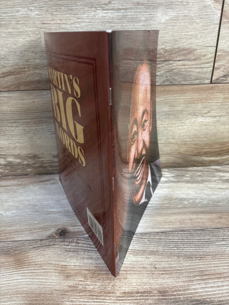 Children’s hardcover book titled 'Martin's Big Words' standing on wood surface