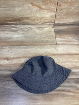 Top-down view of Old Navy baby swim bucket hat (0-6m) showcasing quilted brim and side grommet vent on wood floor background