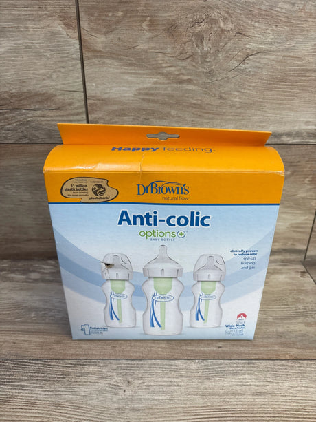 Front of Dr. Brown's Anti-colic wide-neck 3-pack (9 oz) box showing level 1 slow-flow nipples and vent tubing on wood