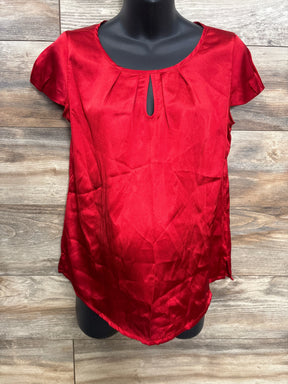 Red satin maternity blouse with short sleeves and keyhole neckline on mannequin