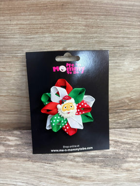 Festive Santa hair bow with red, green, and white ribbons for kids' holiday outfits