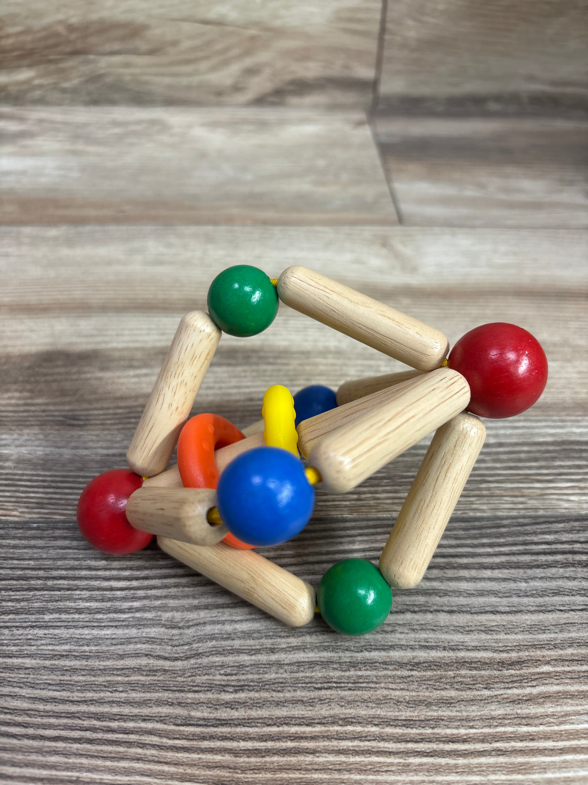 WonderWorld Wooden Triangle Clutching Toy