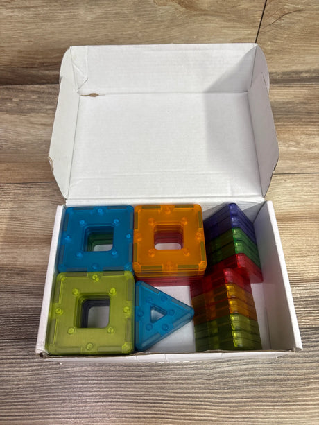Top view of Polydron KinderMag Translucent Starter Set 48pc with colorful translucent tiles in an open box