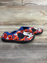 Side view of Disney Baby Mickey Mouse Water Shoes sz 7/8c showcasing red shoes with Mickey print and blue trim on wood plank floor