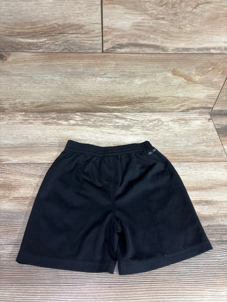 Adidas black mesh shorts for kids size 4T laid flat on a light brown wood surface