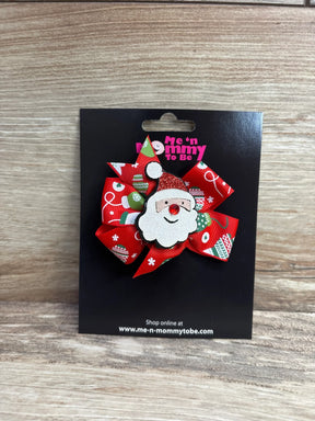 Festive Santa hair bow with red ribbon, snowflakes, and glitter for kids' holiday outfits