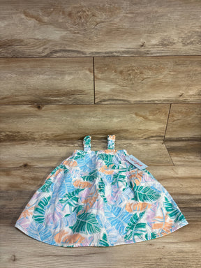 Cat & Jack baby dress with tropical leaf print, smocked bodice, on wood floor