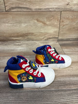 Three-quarter view of Paw Patrol high-top toddler sneakers size 6C with character patch, red/yellow/blue canvas, side zipper