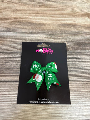 Green Christmas bow with Santa and 'Ho Ho Ho' print, festive kids hair accessory