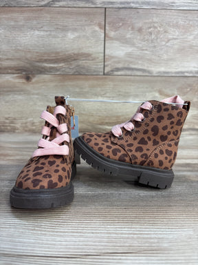 Kids brown leopard print boots with pink laces on wood background