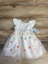 White toddler dress with ruffled sleeves and colorful mushroom embroidery on tulle skirt