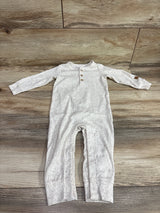 Carter's Ribbed Henley Coverall in ivory with speckled pattern, size 12m, on wood background
