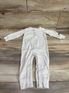 Carter's Ribbed Henley Coverall in ivory with speckled pattern, size 12m, on wood background